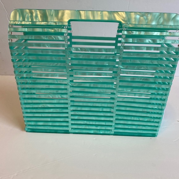 Modcloth Handbags - ModCloth Malibu Skye Full Transparency clutch NWT